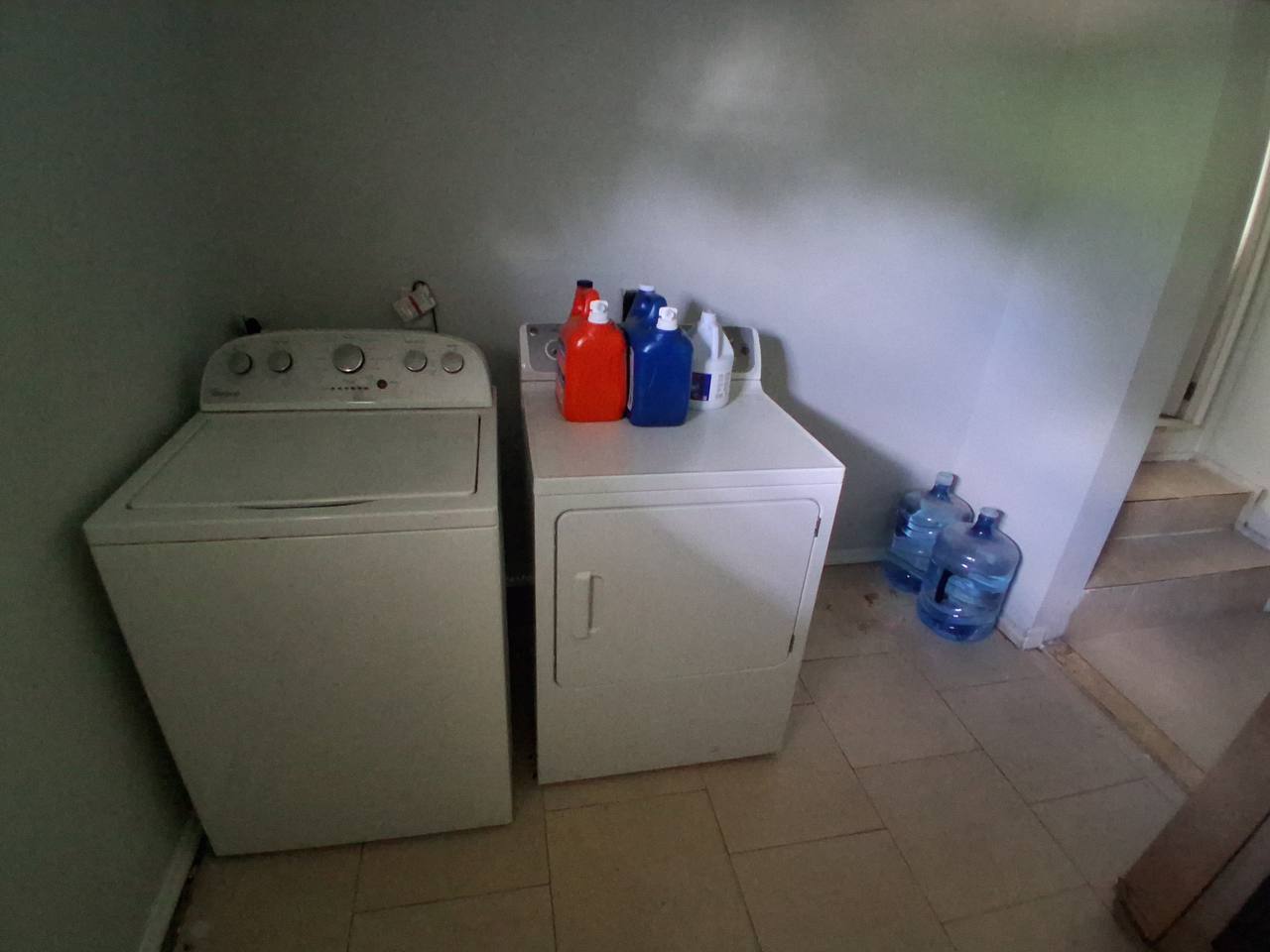 Archived shared laundry area with washer and dryer