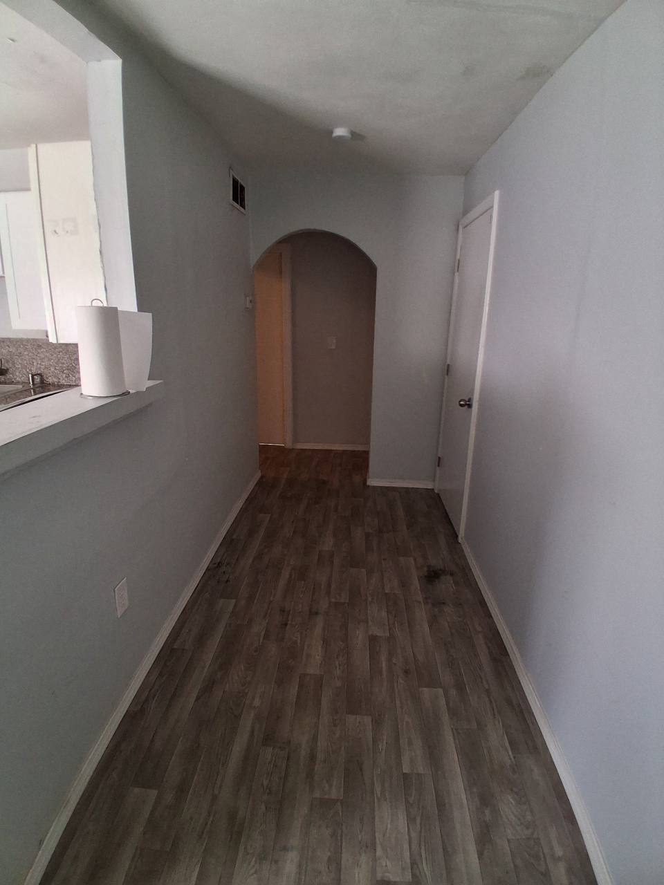 Archived hallway and kitchen pass-through area
